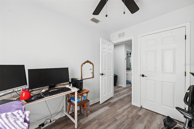 4737 6th St, Zephyrhills, FL 33542 - office with ceiling fan, wood finished floors, and baseboards
