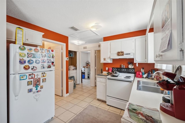 4737 6th St, Zephyrhills, FL 33542 - kitchen featuring white appliances, a sink, under cabinet range hood, light countertops, and white cabinetry