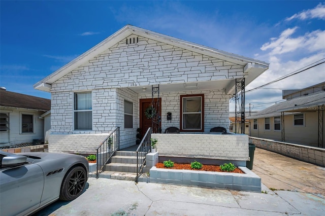 124 Athens St, Tarpon Springs, FL 34689 - view of front of property with covered porch