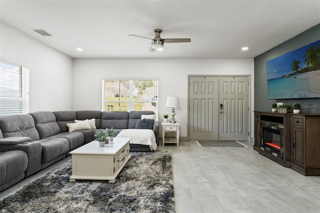5328 Baldock Ave, Spring Hill, FL 34608 - living area featuring a ceiling fan, plenty of natural light, and recessed lighting