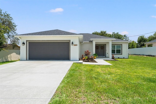 5328 Baldock Ave, Spring Hill, FL 34608 - view of front facade featuring a garage, concrete driveway, stucco siding, a front lawn, and a shingled roof