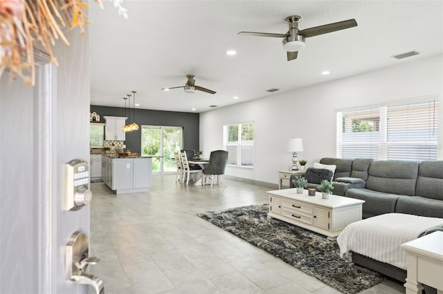 5328 Baldock Ave, Spring Hill, FL 34608 - living area featuring a ceiling fan and recessed lighting