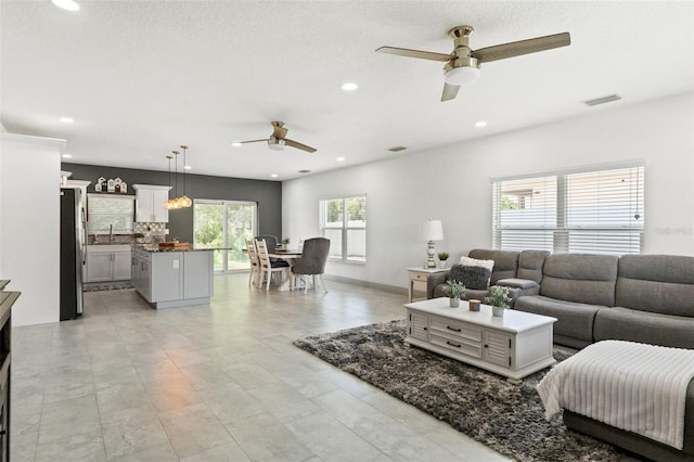 5328 Baldock Ave, Spring Hill, FL 34608 - living area with ceiling fan and recessed lighting
