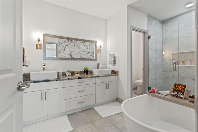 5328 Baldock Ave, Spring Hill, FL 34608 - bathroom with double vanity, a stall shower, and a freestanding tub