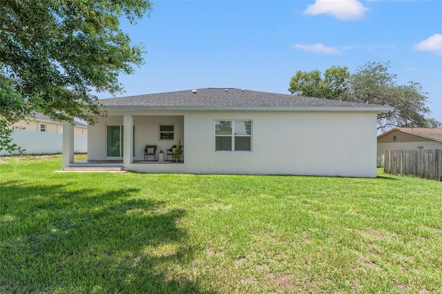 5328 Baldock Ave, Spring Hill, FL 34608 - rear view of house with stucco siding and a patio