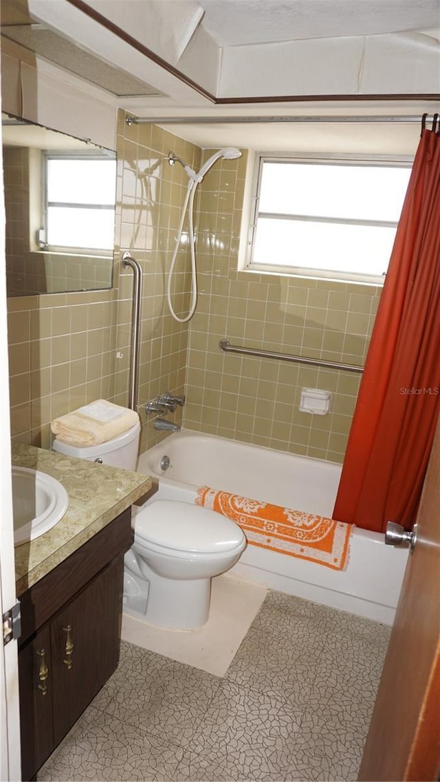 5636 Dolores Dr, Holiday, FL 34690 - bathroom featuring shower / bath combination with curtain, plenty of natural light, toilet, and vanity