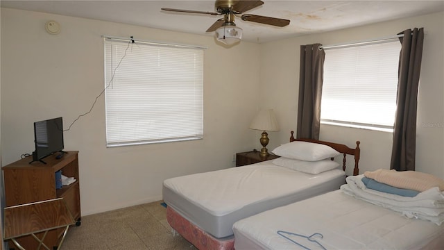 5636 Dolores Dr, Holiday, FL 34690 - bedroom with ceiling fan
