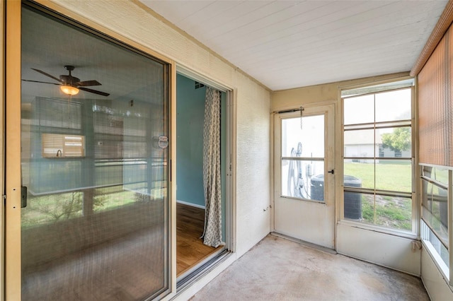 9212 Estrada Pl, New Port Richey, FL 34655 - unfurnished sunroom with ceiling fan