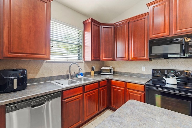 12055 Colony Lakes Blvd, New Port Richey, FL 34654 - kitchen featuring black appliances, a sink, dark brown cabinets, and backsplash