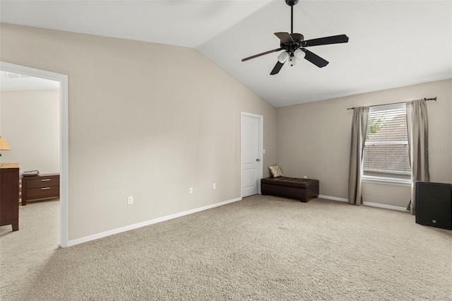 12055 Colony Lakes Blvd, New Port Richey, FL 34654 - unfurnished bedroom featuring carpet floors, lofted ceiling, baseboards, and ceiling fan