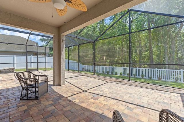 12055 Colony Lakes Blvd, New Port Richey, FL 34654 - fenced backyard featuring a patio, a ceiling fan, and glass enclosure