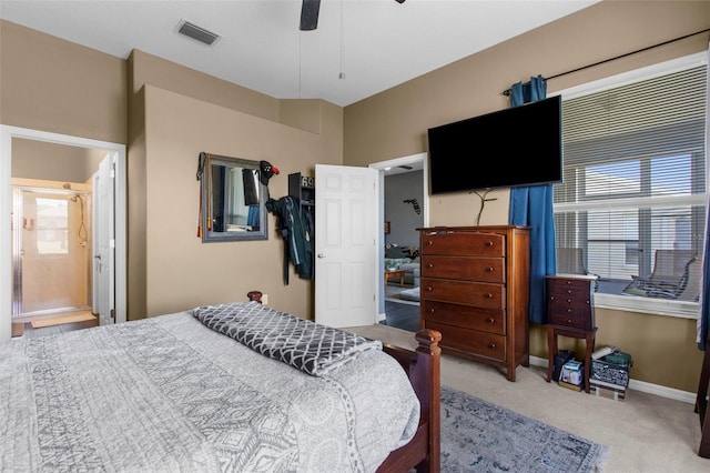 9407 Burnam Dr, Weeki Wachee, FL 34613 - carpeted bedroom with baseboards and a ceiling fan