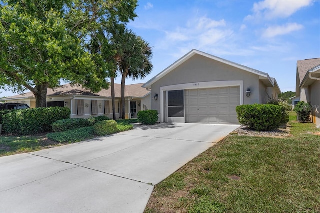 9407 Burnam Dr, Weeki Wachee, FL 34613 - single story home with an attached garage, concrete driveway, and stucco siding