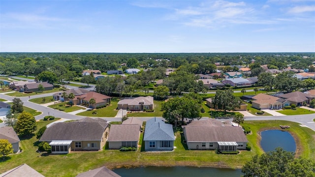 9407 Burnam Dr, Weeki Wachee, FL 34613 - aerial perspective of suburban area with a large body of water