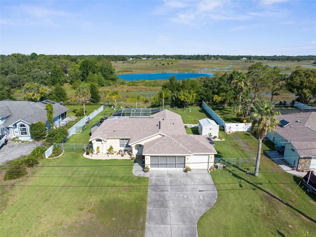 2585 Waterfall Dr, Spring Hill, FL 34608 - aerial view of property and surrounding area with a large body of water