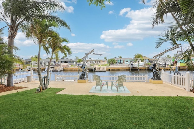 4942 Blue Heron Dr, New Port Richey, FL 34652 - dock with a water view, a yard, and a residential view