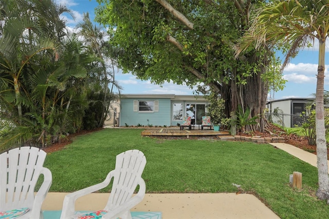 4942 Blue Heron Dr, New Port Richey, FL 34652 - view of yard featuring a deck