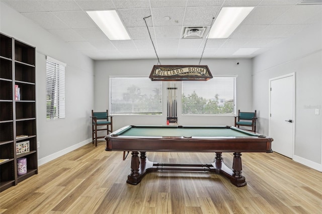 4942 Blue Heron Dr, New Port Richey, FL 34652 - rec room with billiards, a paneled ceiling, light wood finished floors, and baseboards
