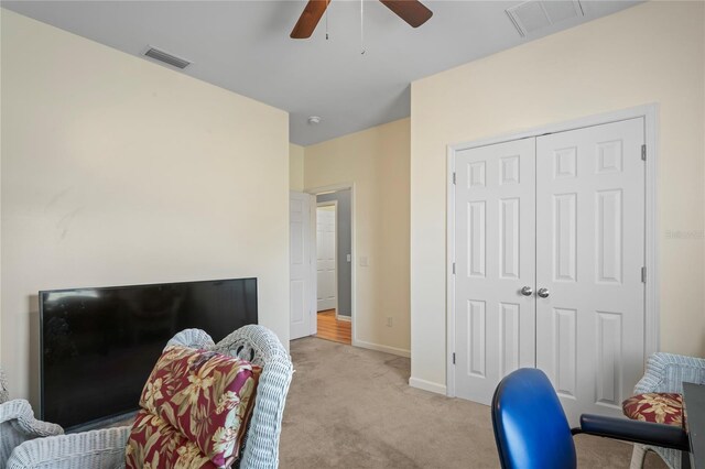 15613 Charmwood Dr, Hudson, FL 34667 - office area featuring light colored carpet, ceiling fan, and baseboards