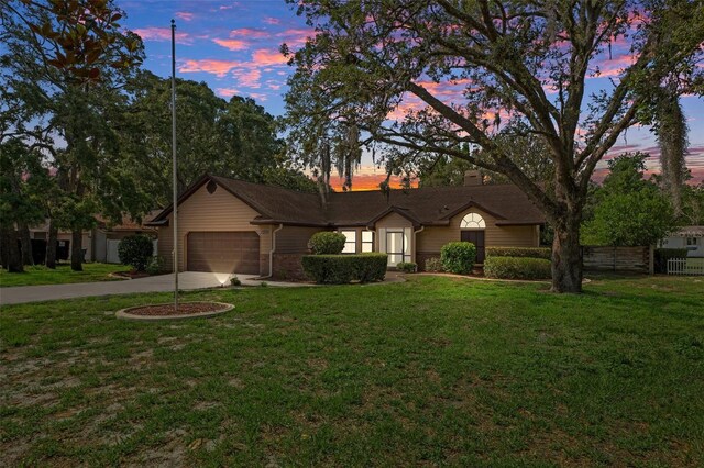 8402 Lake Hill Ct, Spring Hill, FL 34608 - single story home with a garage, a front lawn, and driveway
