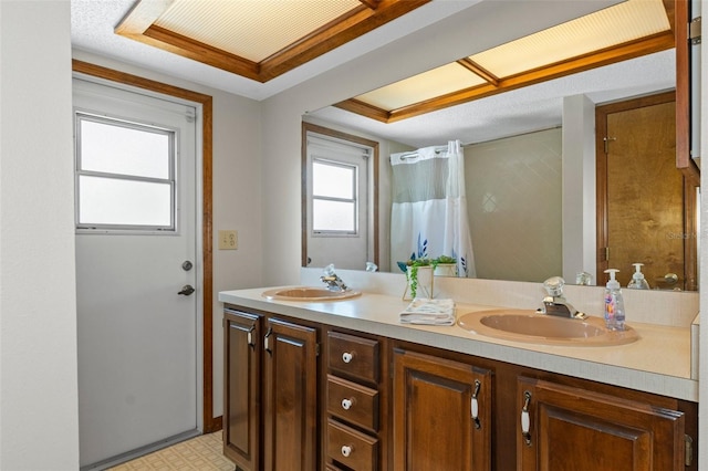 8402 Lake Hill Ct, Spring Hill, FL 34608 - full bathroom with double vanity, tile patterned floors, and curtained shower