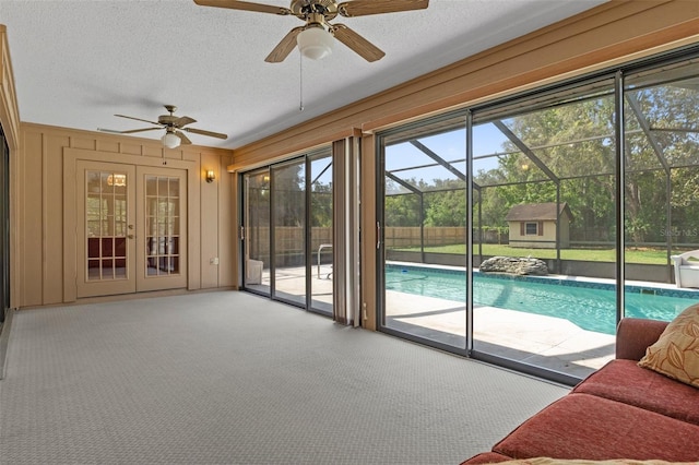 8402 Lake Hill Ct, Spring Hill, FL 34608 - sunroom with a ceiling fan and a swimming pool