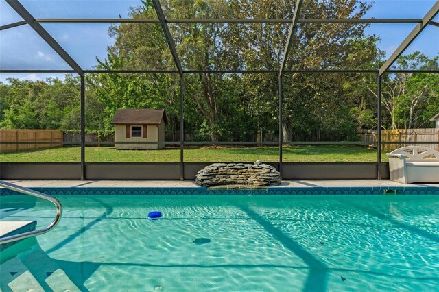 8402 Lake Hill Ct, Spring Hill, FL 34608 - view of pool with a lanai, view of wooded area, and a patio