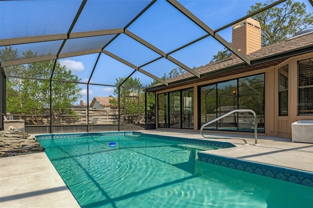 8402 Lake Hill Ct, Spring Hill, FL 34608 - outdoor pool featuring a patio and glass enclosure