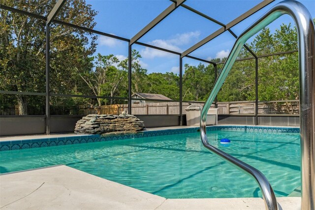 8402 Lake Hill Ct, Spring Hill, FL 34608 - view of pool with a fenced backyard