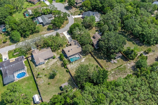 8402 Lake Hill Ct, Spring Hill, FL 34608 - aerial view of property and surrounding area with a pool area and nearby suburban area