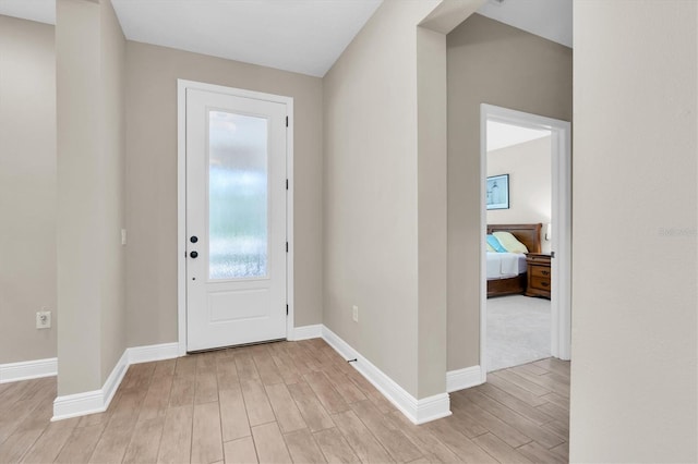 12420 Rangeland Blvd, Odessa, FL 33556 - entryway featuring light wood finished floors and baseboards