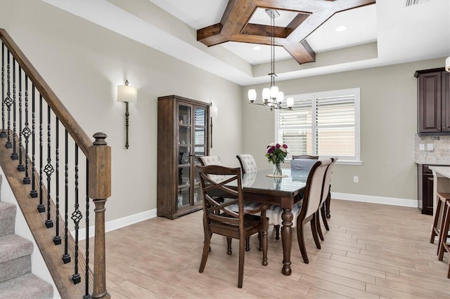 12420 Rangeland Blvd, Odessa, FL 33556 - dining area with coffered ceiling, a chandelier, light wood finished floors, baseboards, and stairs