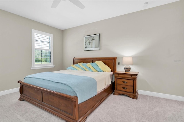 12420 Rangeland Blvd, Odessa, FL 33556 - bedroom with light colored carpet, baseboards, and ceiling fan