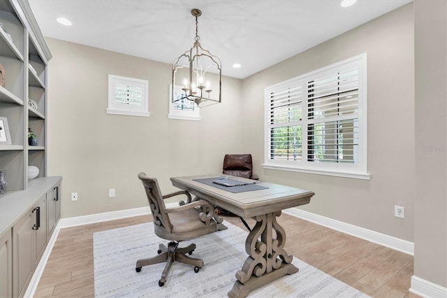 12420 Rangeland Blvd, Odessa, FL 33556 - home office with light wood-style floors, a chandelier, baseboards, and recessed lighting