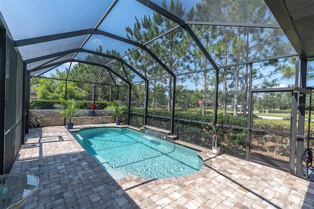 12420 Rangeland Blvd, Odessa, FL 33556 - swimming pool with a patio and glass enclosure