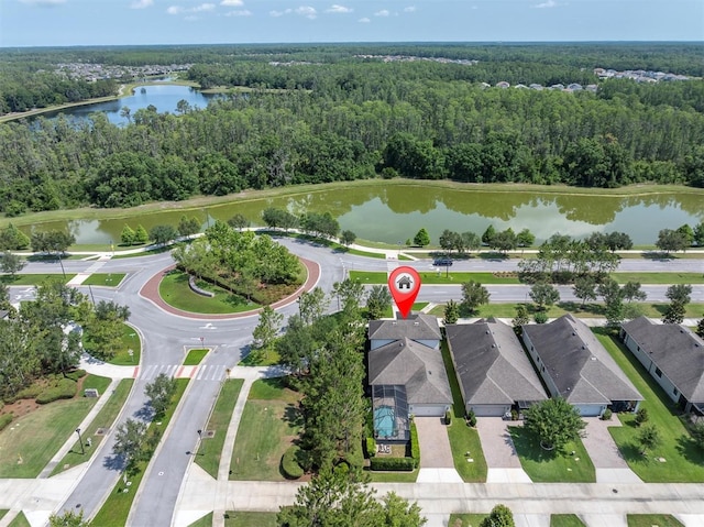 12420 Rangeland Blvd, Odessa, FL 33556 - aerial view of property's location with a heavily wooded area and a nearby body of water