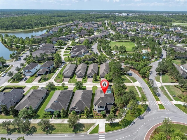 12420 Rangeland Blvd, Odessa, FL 33556 - aerial view of property's location with nearby suburban area, a nearby body of water, and a forest