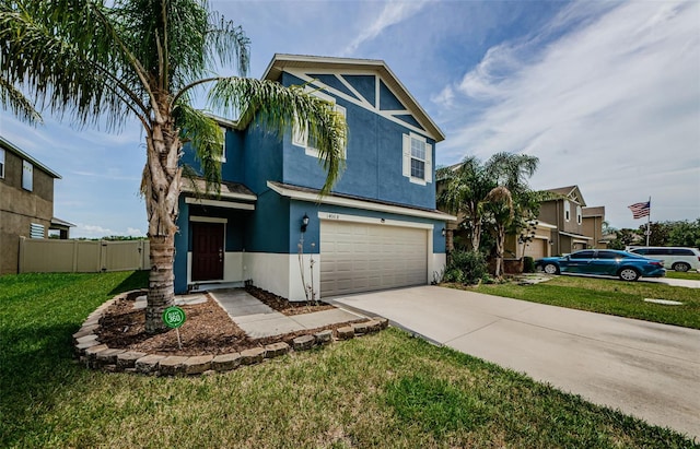 14008 Lugano Ct, Hudson, FL 34669 - view of front of home with stucco siding, a garage, and driveway