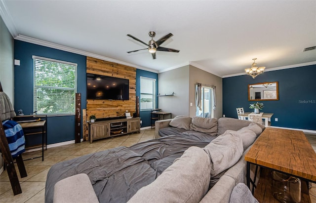 14008 Lugano Ct, Hudson, FL 34669 - tiled living room featuring plenty of natural light, an accent wall, a chandelier, crown molding, and wood walls