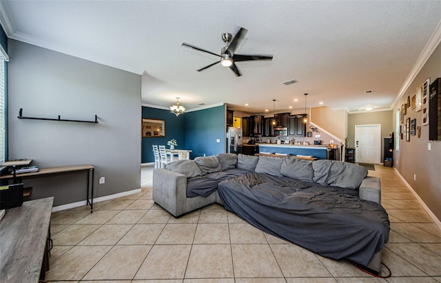 14008 Lugano Ct, Hudson, FL 34669 - living area with ornamental molding, light tile patterned floors, ceiling fan, a chandelier, and baseboards