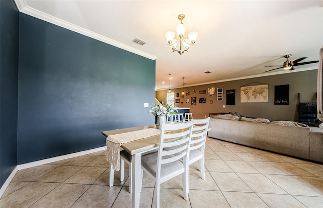 14008 Lugano Ct, Hudson, FL 34669 - dining area with crown molding, light tile patterned flooring, a chandelier, a ceiling fan, and baseboards