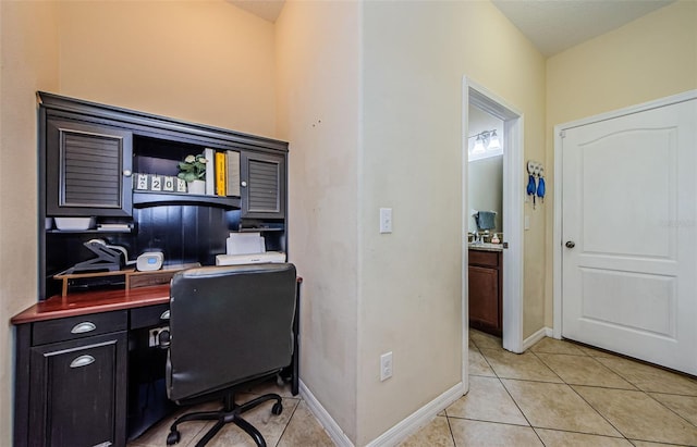 14008 Lugano Ct, Hudson, FL 34669 - office space featuring light tile patterned flooring and baseboards