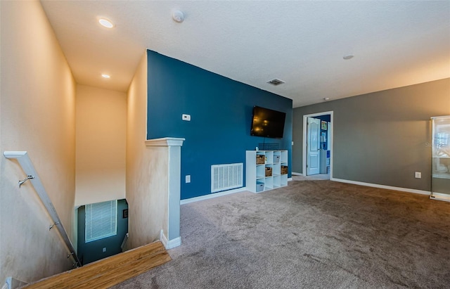 14008 Lugano Ct, Hudson, FL 34669 - unfurnished living room with carpet floors and baseboards