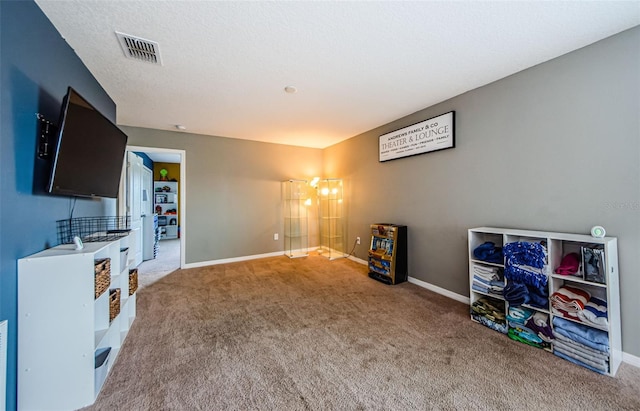 14008 Lugano Ct, Hudson, FL 34669 - game room with carpet flooring and baseboards