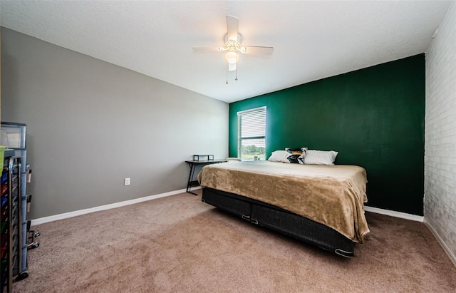 14008 Lugano Ct, Hudson, FL 34669 - carpeted bedroom with baseboards and a ceiling fan