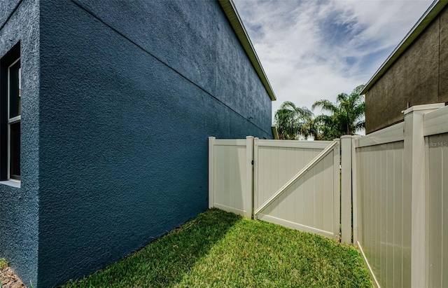 14008 Lugano Ct, Hudson, FL 34669 - view of yard featuring a gate