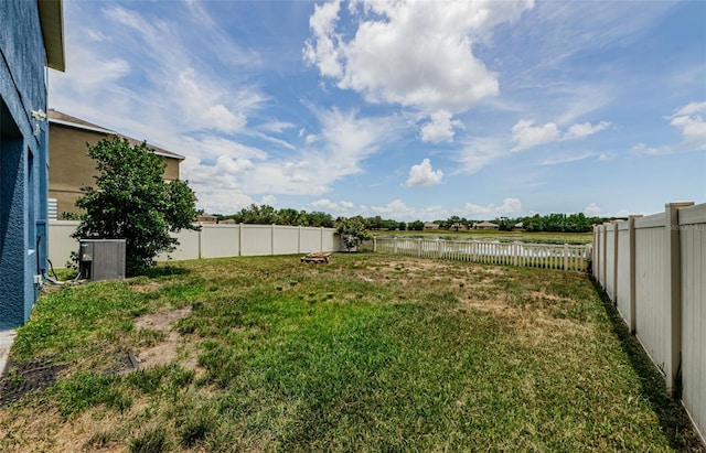 14008 Lugano Ct, Hudson, FL 34669 - view of yard with a water view and central AC unit