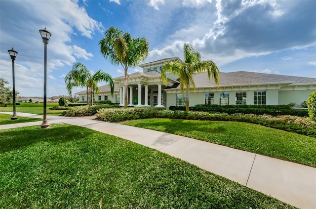 14008 Lugano Ct, Hudson, FL 34669 - view of front of house with a front yard