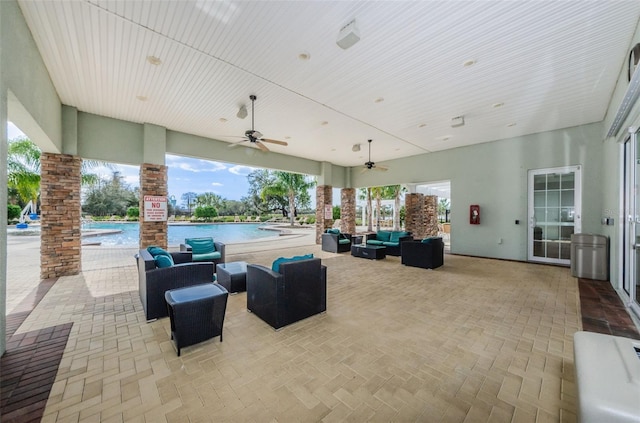 14008 Lugano Ct, Hudson, FL 34669 - view of patio / terrace with an outdoor living space, a community pool, and ceiling fan