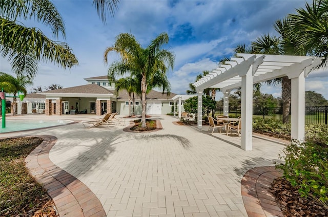 14008 Lugano Ct, Hudson, FL 34669 - view of property's community with a pergola, a swimming pool, and a patio area